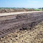 Subgrade prior to fly ash placement. After tilling and prior to compaction.